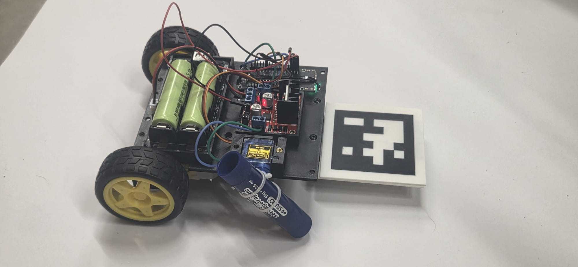 Second-generation SaySpark: 3D-printed chassis with 18650 batteries, marker servo, and an AprilTag